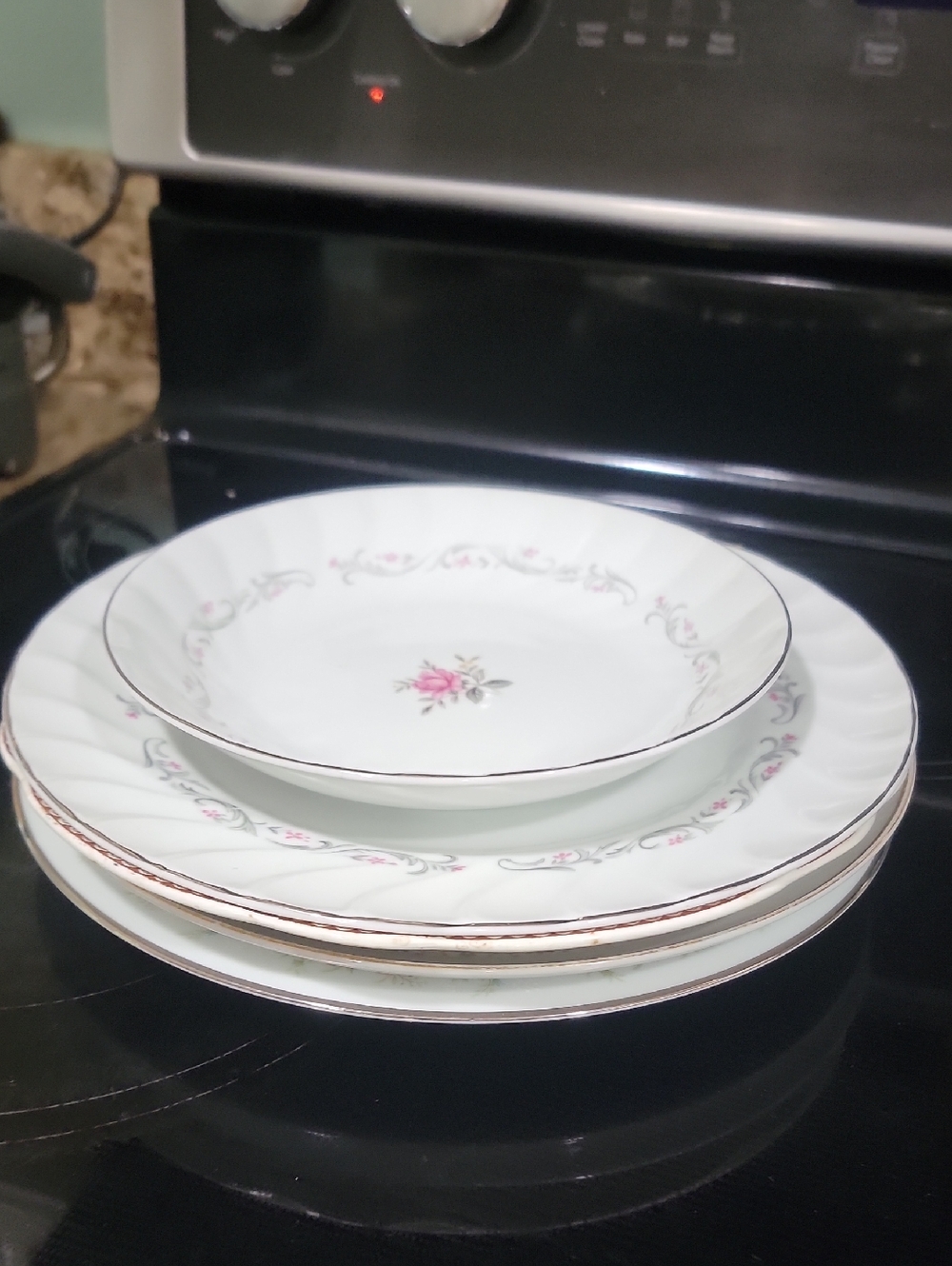 White Porcelain Dinner Plate and Bowl Set with Pink Floral Accent